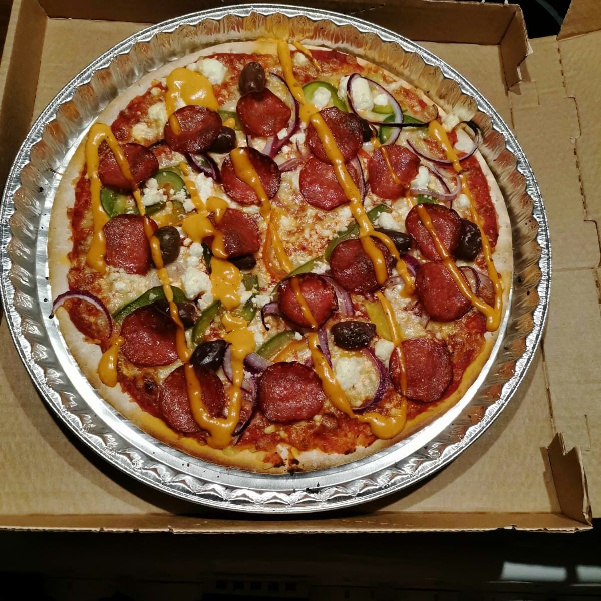 Tuiskun pizza  oli maukkaan näköinen.